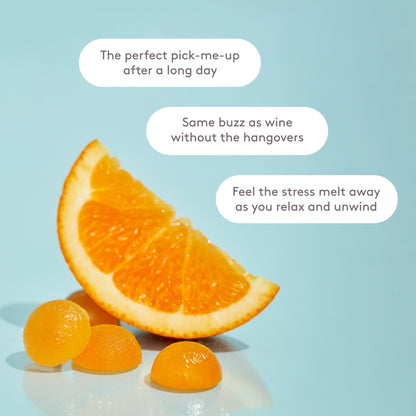 A closeup image of Feals Relax Gummies next to a slice of orange against blue background. There are 3 text bubbles that say "The perfect pick-me-up after a long day", "Same buzz as wine without the hangovers", "Feel the stress melt away as you relax and unwind"
